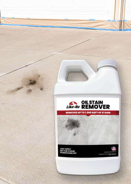 Like-Nu Oil Stain Remover bottle on concrete, designed to remove oil stains effectively.