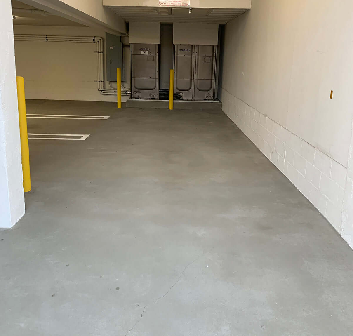 Like Nu Concrete Resurfacing of a parking garage floor with smooth and clean finish.