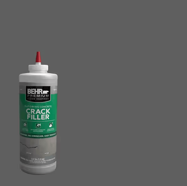 BEHR PREMIUM Crack Filler bottle for fast-drying concrete repair, ideal for sealing cracks up to 1/2" wide.
