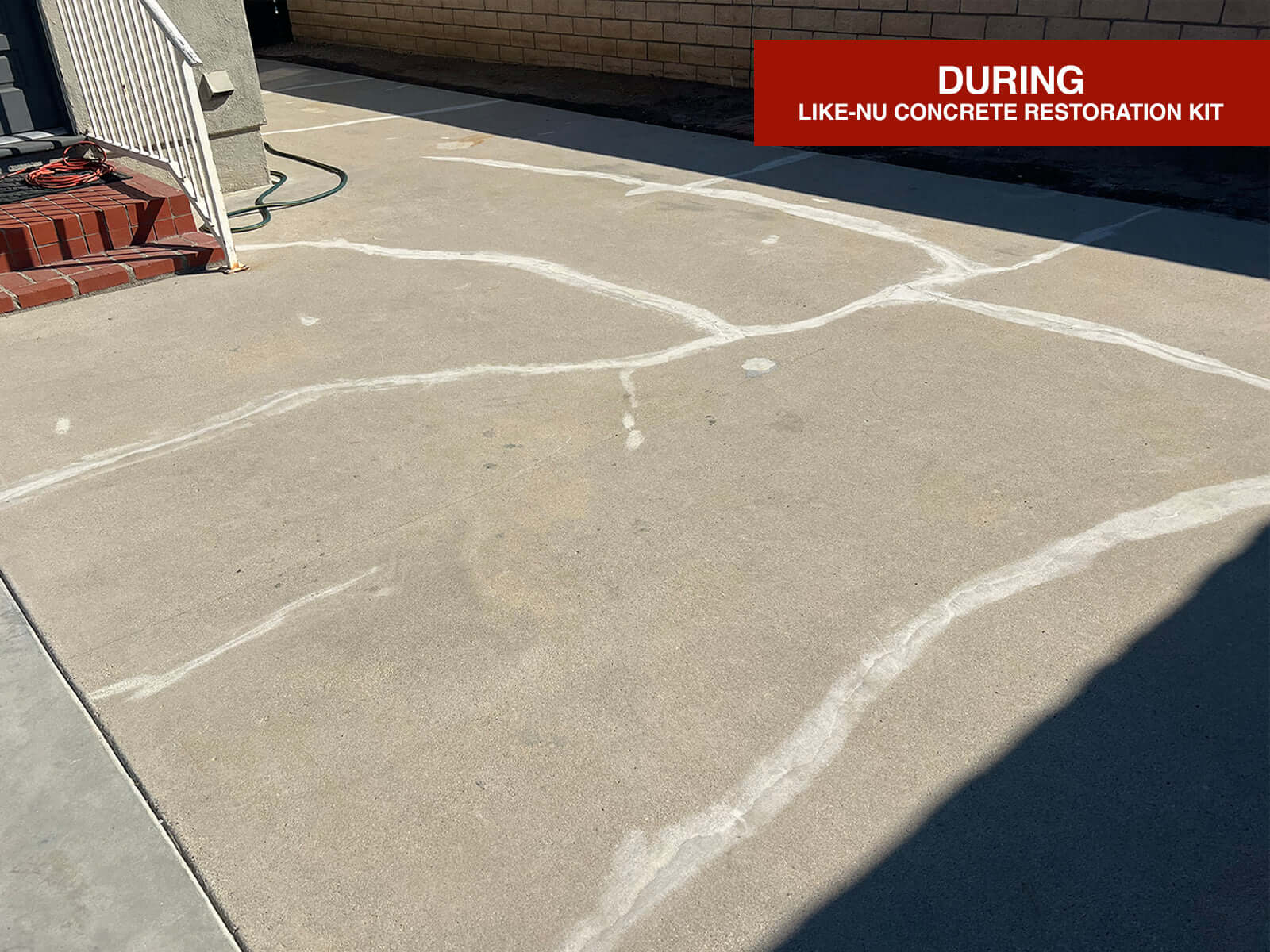 Cracked concrete surface during restoration process using Like-Nu Concrete Restoration Kit with BEHR PREMIUM Crack Filler.