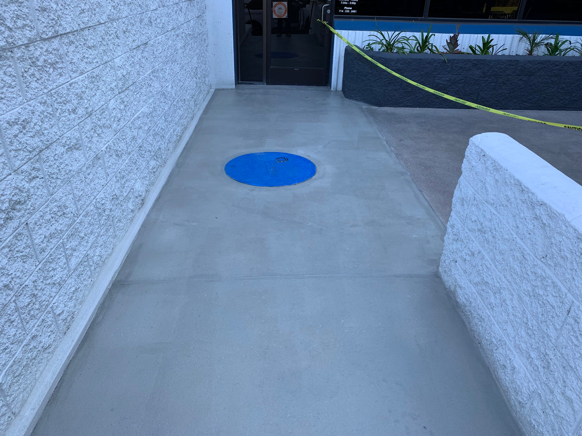 Concrete repair blended to a uniform natural finish with Like-Nu
