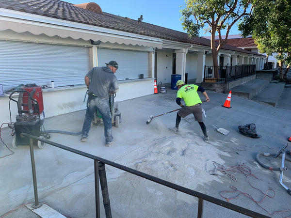 Old patchwork, new concrete next to old before
