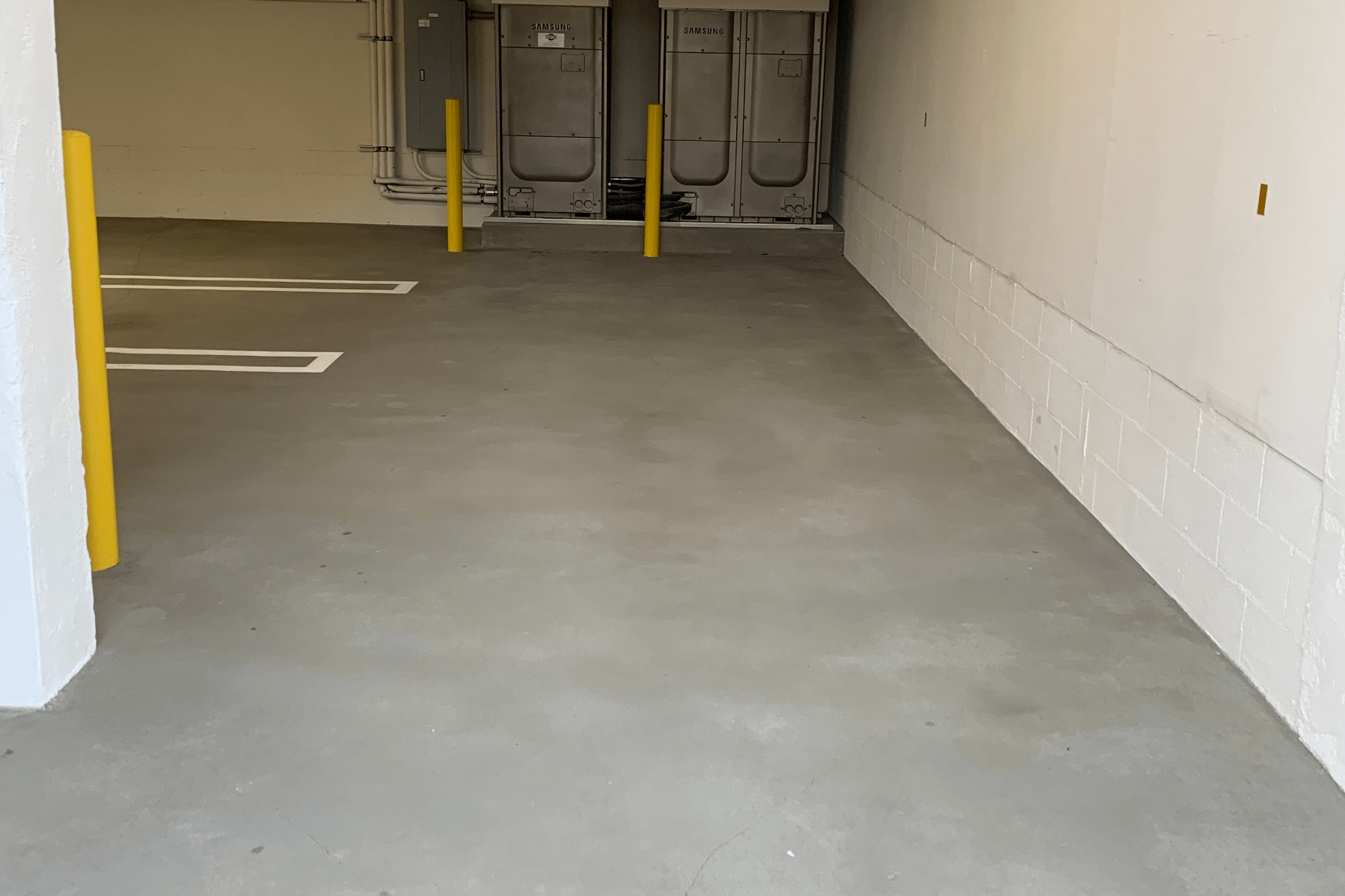 Like Nu Concrete Resurfacing applied to indoor parking garage floor for a fresh and smooth finish.