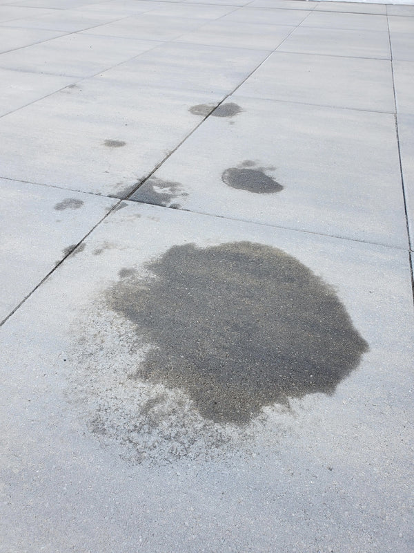 Oil stain on concrete before