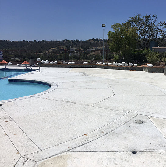Pool-side patio before restoration