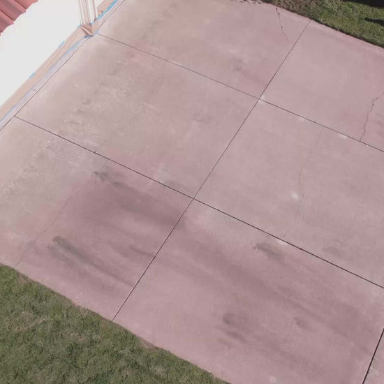 Aerial view of a concrete driveway showing stains and wear, ideal for Like-Nu Concrete Restoration Kit application.